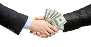 25364-lending-borrowing-money-shake-hands-debt-dollars-business-deal-wide-1200w-tn